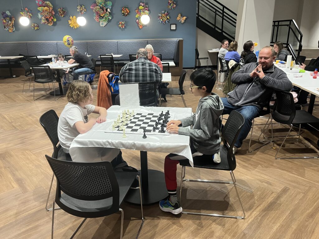 Kids playing chess